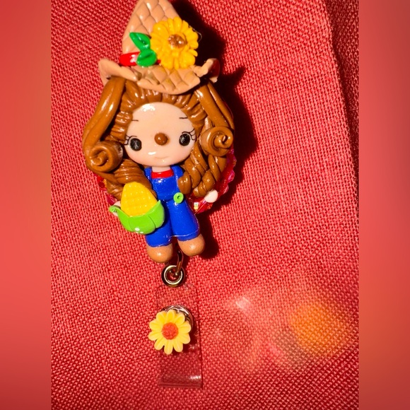 Charming Doll Keychain with Blue Overalls and Brown Hair - Picture 5 of 6